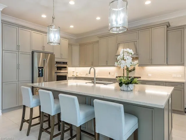 Kitchen with expansive counter top and seating for four.