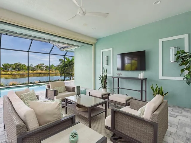 Casually relax in the covered lanai seating area.