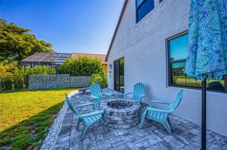 View of patio / terrace with an outdoor fire pit
