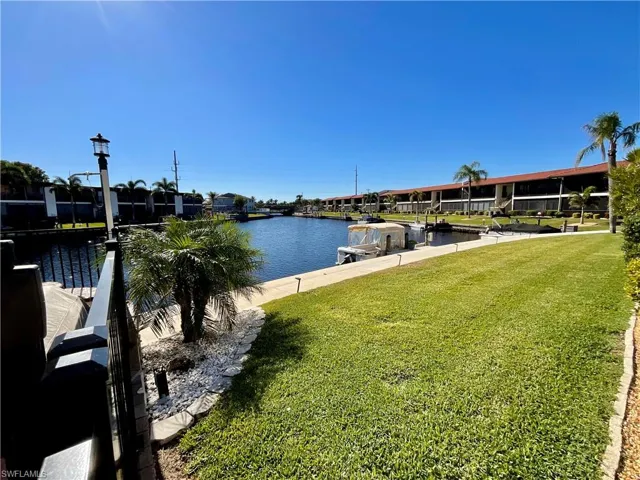 View of water feature featuring a dock