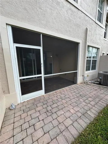 View of patio featuring central AC
