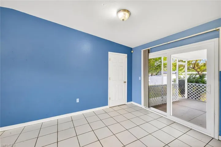 Unfurnished room featuring baseboards and tile patterned floors