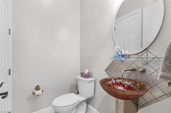 Bathroom with toilet and a sink