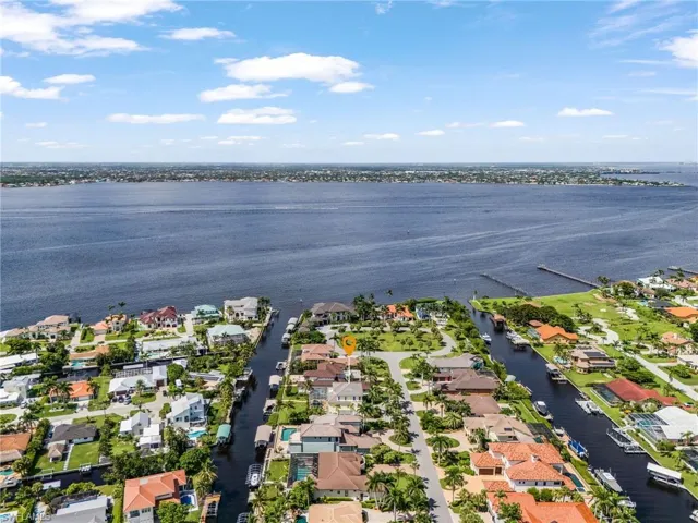 Aerial view of residential area with a nearby body of water