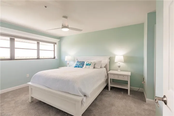 Bedroom featuring carpet and ceiling fan
