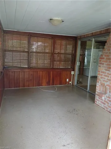 Front entry Enclosed Porch with Sliding Doors to Main Living Area