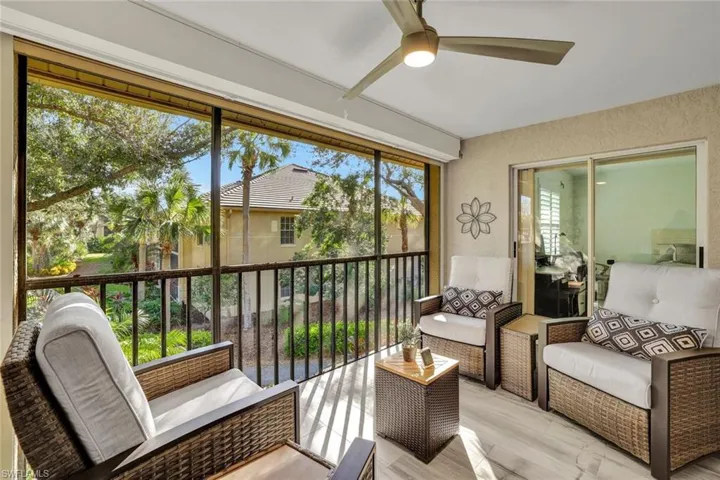 Sunroom / solarium with ceiling fan and plenty of natural light
