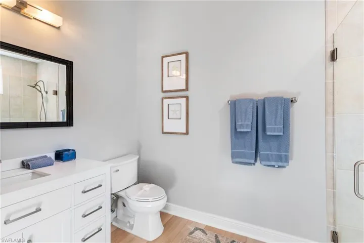 Bathroom with vanity and walk in shower