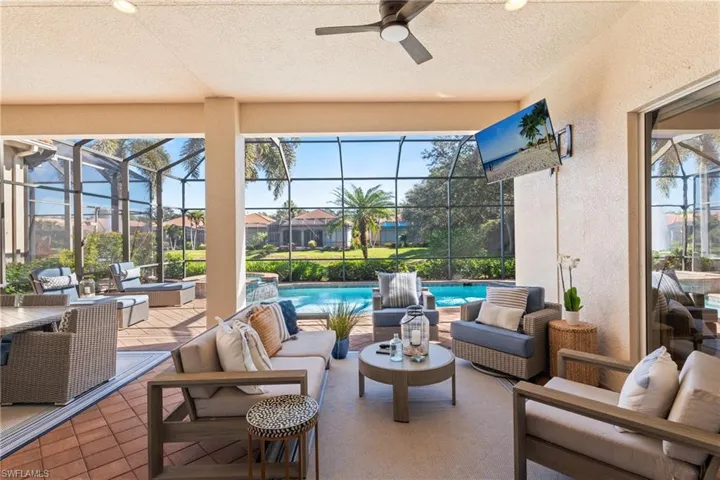 View of patio / terrace featuring outdoor lounge area, ceiling fan, and t.v.