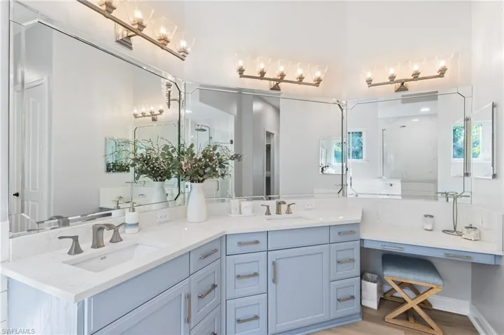 Beautiful soft blue cabinets with your own vanity