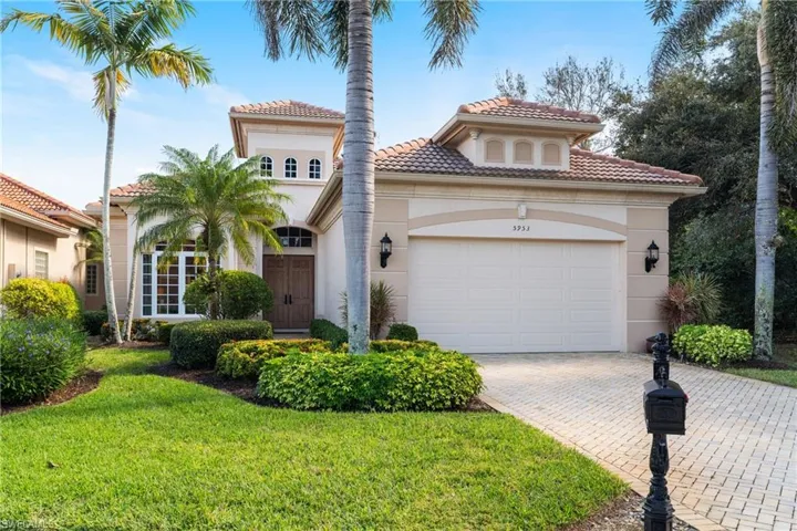 Mediterranean / spanish-style home featuring a 2 car garage