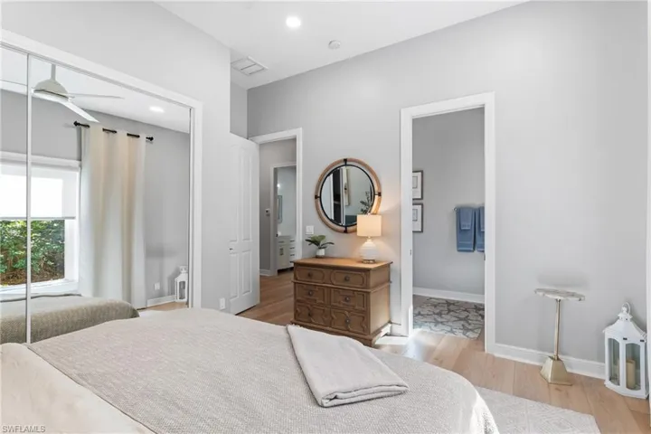 En-Suite Bedroom with custom blinds and drapery