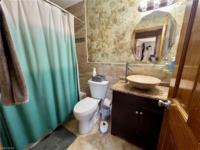 3401 E 3rd  ST, Lehigh Acres, FL 33936
