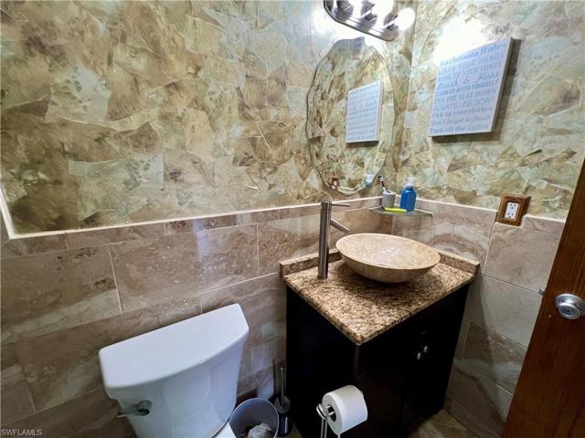 3401 E 3rd  ST, Lehigh Acres, FL 33936