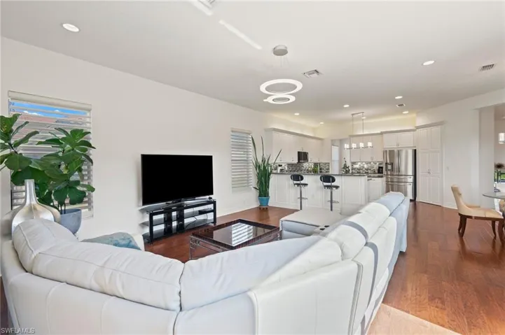 Living room featuring wood-type flooring