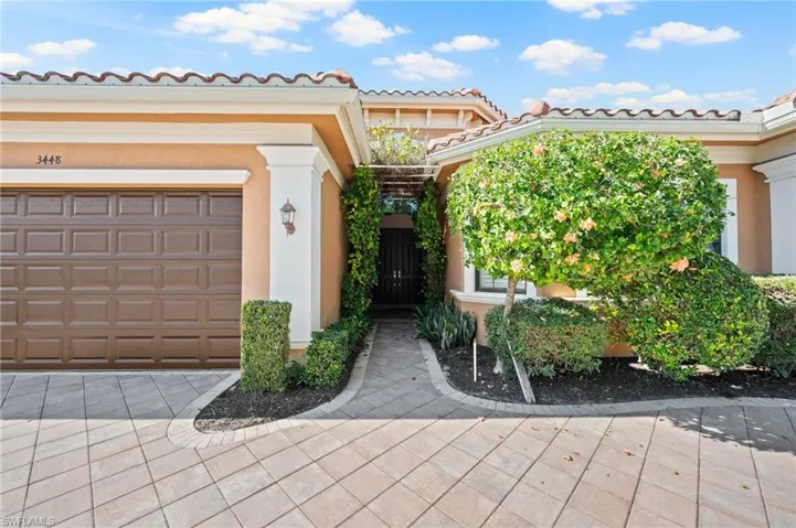 Property entrance featuring a garage