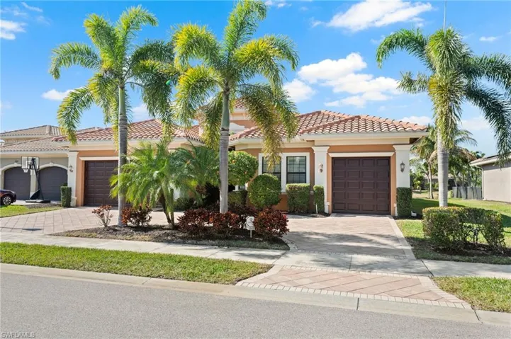 Mediterranean / spanish-style home featuring a garage