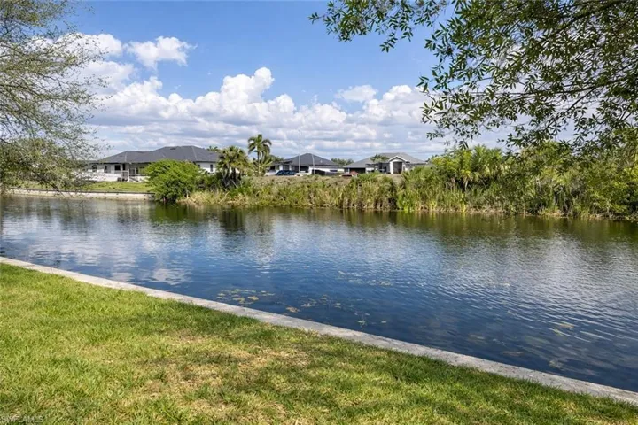 Water view featuring nearby suburban area
