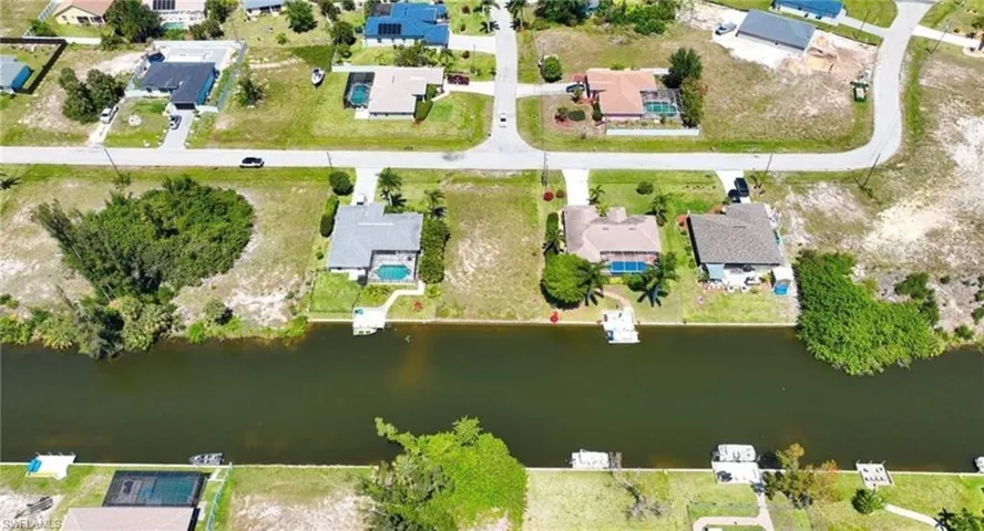 Aerial view of residential area with a nearby body of water