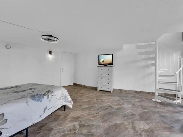 Cabana with spiral staircase to main living area
