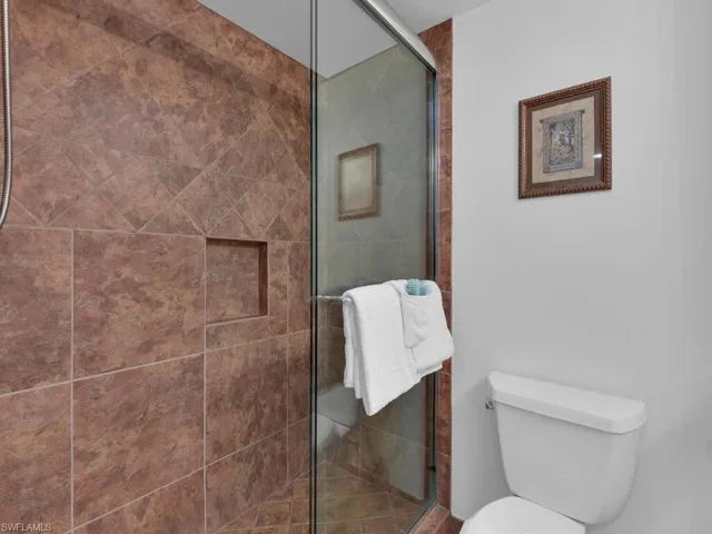 Bathroom with a frameless shower door