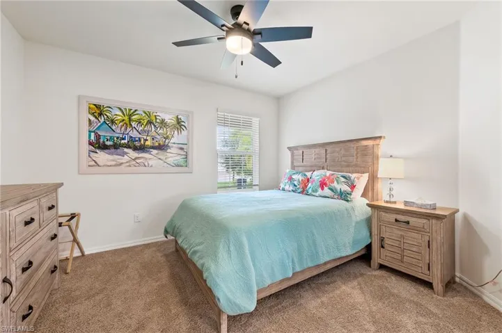 Need space for guests? This is the den area currently set up as a third BR. You can see it is larger than the second BR with a queen bed, nightstand and dresser