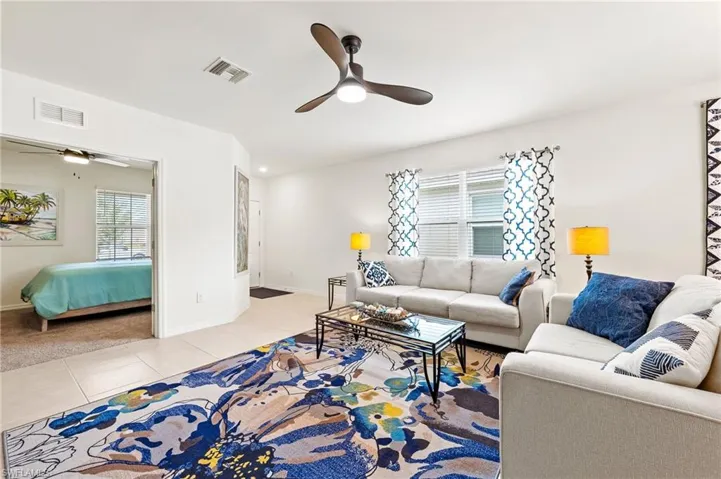 Even though this is legally a 2BR, the den you see in this picture is large enough for a queen bed and has solid french doors to close for privacy for anyone who wants to sleep here