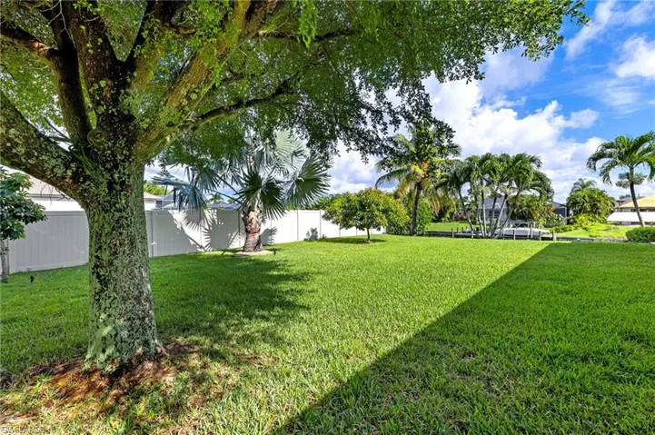 View of fenced backyard