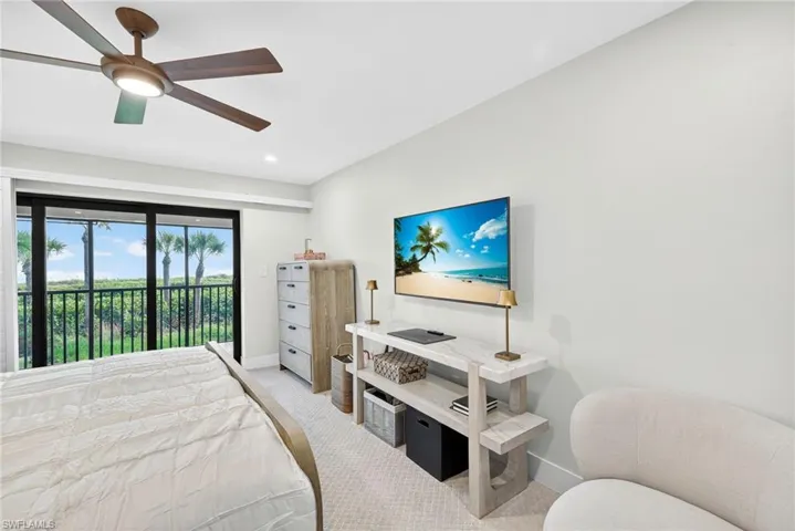 Bedroom featuring carpet flooring, access to exterior, ceiling fan, and recessed lighting