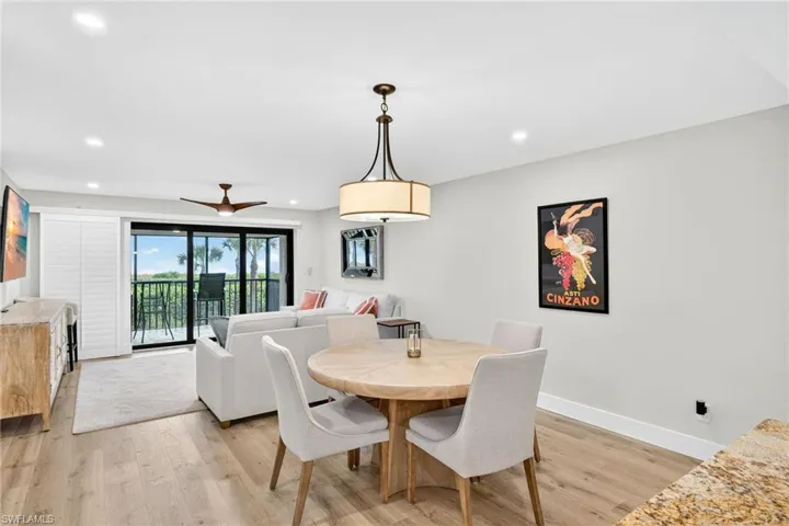 Dining space featuring light wood-style floors and recessed lighting