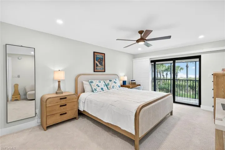 Bedroom featuring carpet floors, access to outside, a ceiling fan, and recessed lighting