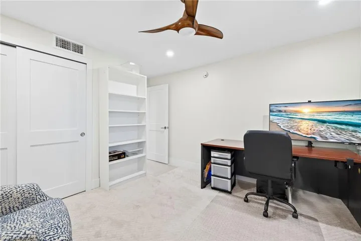 Office featuring light carpet, recessed lighting, and ceiling fan