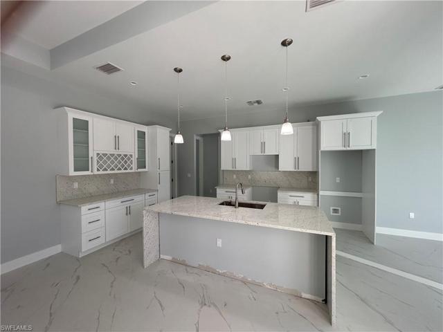 490 39th AVE NE, NAPLES FL 34120