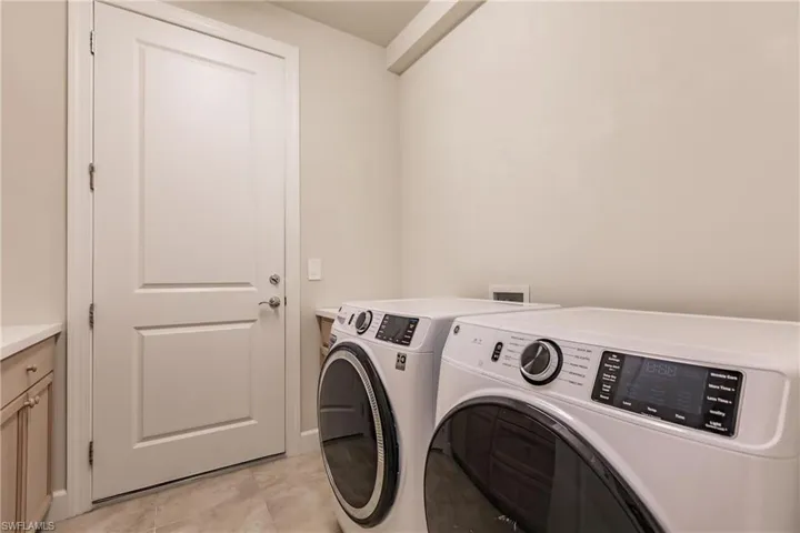 Laundry room with built in shelving