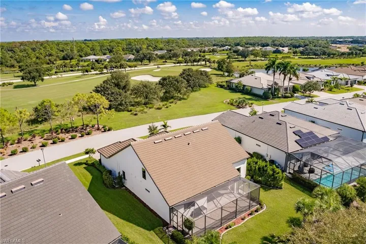 Aeriel view of home and golf course