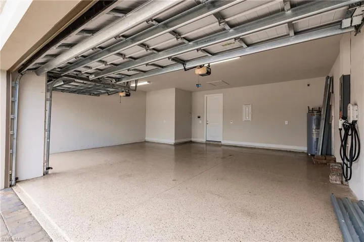 3 car garage with 4' extension and epoxy floor