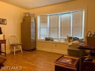 Living area featuring light hardwood / wood-style floors