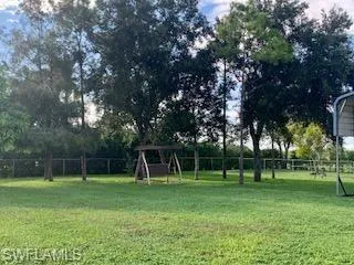 View of yard with a playground