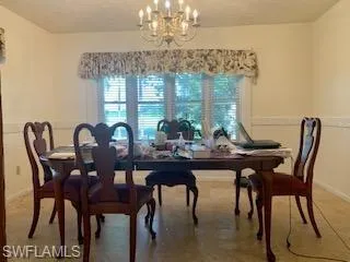 Dining space with an inviting chandelier