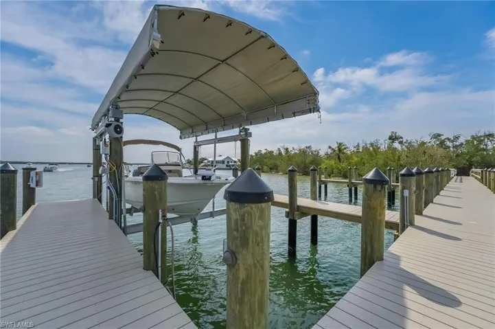 Private Boat Dock, Lift and Boat cover.