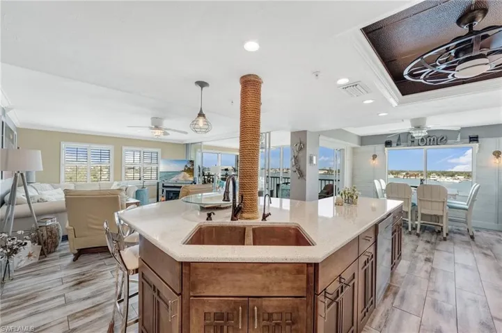Open concept kitchen, living area, dining room and out onto the Lanai with water views everywhere!