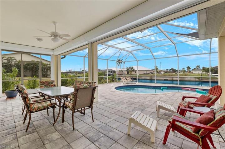 The large covered pool area gives plenty of shaded space and the sun lovers still have more than enough space to play in the sun. All this is also protected by electric hurricane shutters.