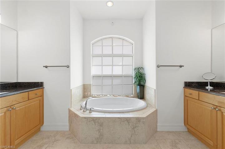 Enjoy a relaxing bath in your Owner's retreat. The dual sinks allow for added space.