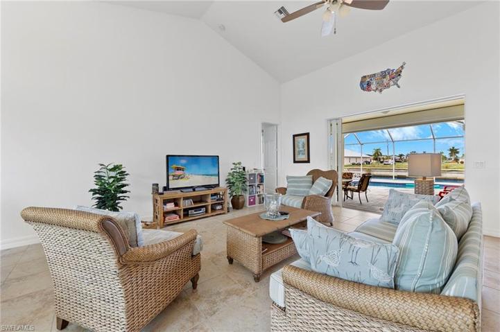 Large pocket sliders open to the oversized pool area which overlooks the waterway.