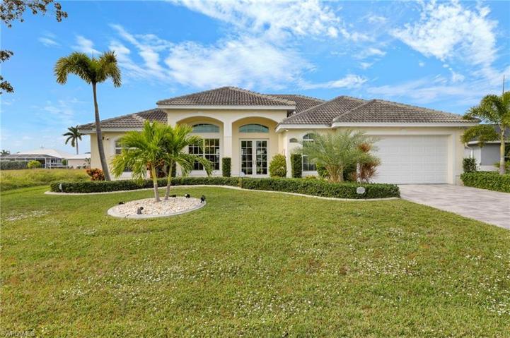 The elegant front elevation makes for great curb appeal and allows for a bright and light home. For added security the windows are all impact rated and the home features a cameras.