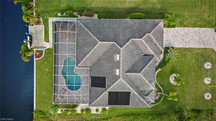 Check our the size of the pool deck!!! Solar panels will keep your pool heated.