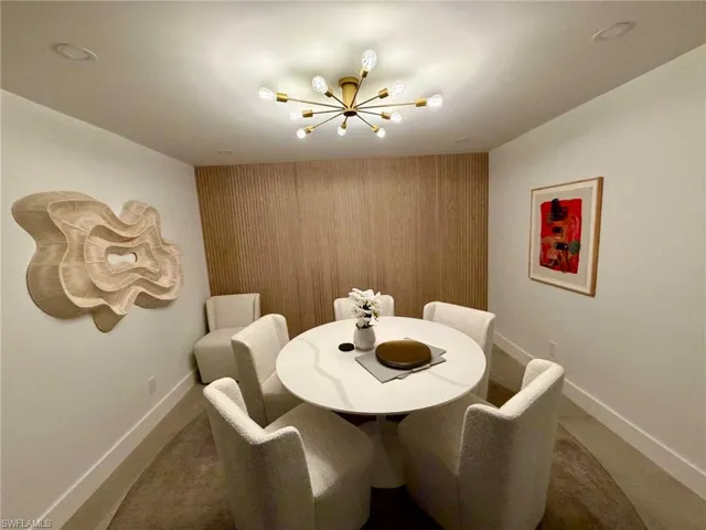 Accent wall featuring vertical wood paneling