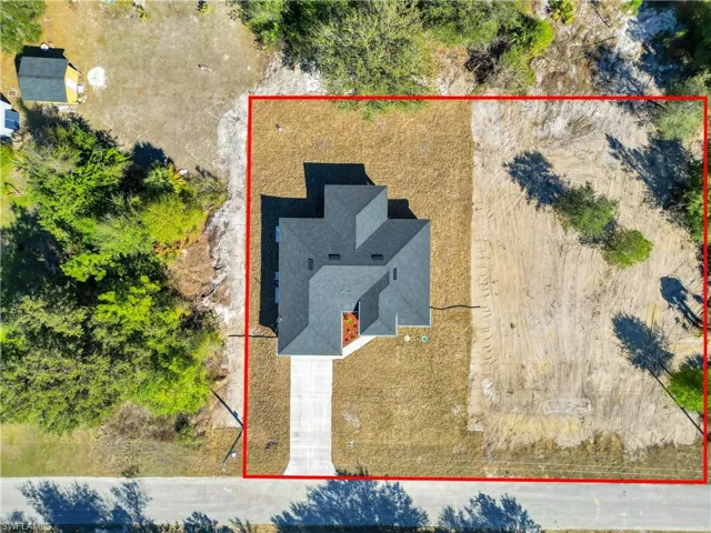 View from above of property featuring property parcel outlined