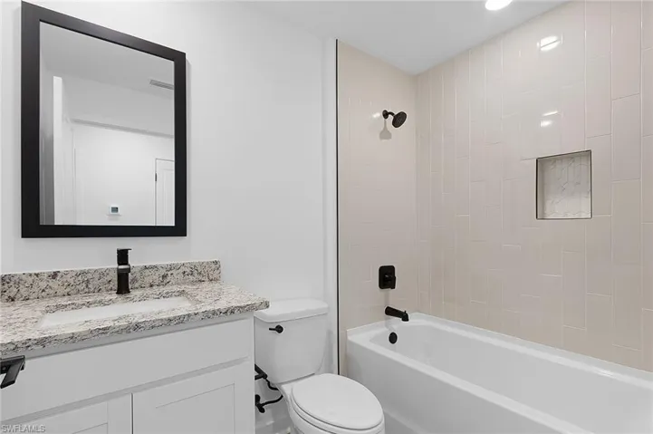 Full bath with vanity and  shower combination