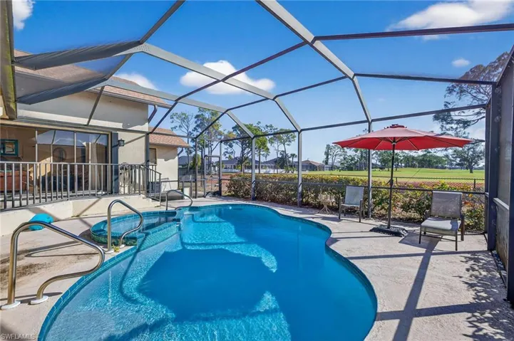 Swimming pool with a patio, a, and a lanai